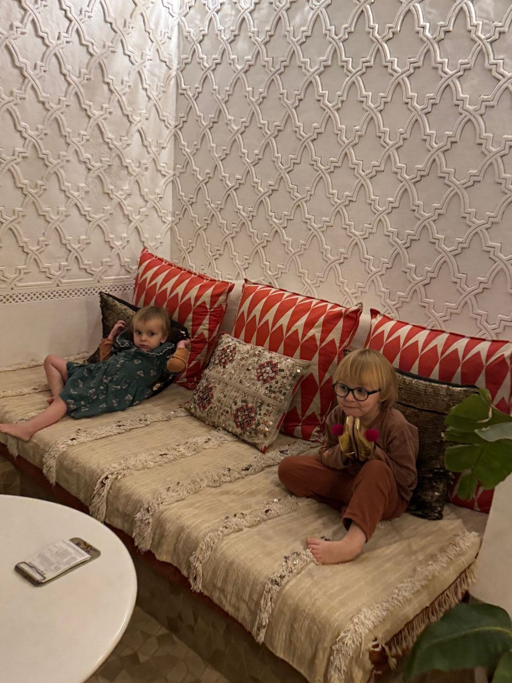 The kids at home on the cushions